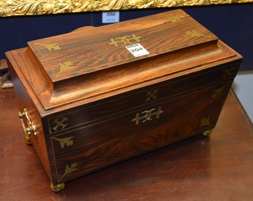 A Victorian rosewood & brass inlaid tea caddy, lacking mixing glass & tea compartment covers,