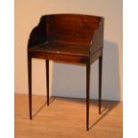 A mahogany washstand circa late 18th/early 19th century, with panelled splash back,