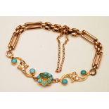 An Edwardian 15ct gold turquoise and diamond bracelet,