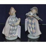 A pair of Lladro child musician jester figures, in harlequin costume, one playing the fiddle,