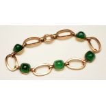 A 9ct gold and green cabochon bracelet,