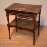 An Edwardian rosewood inlaid card table, with swivel folding top enclosing felt lined interior,