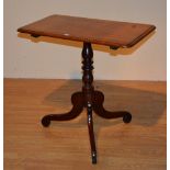 A mahogany snap top tea table circa 19th century, raised on turned column and tripod base,