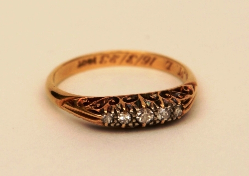 An Edwardian 18ct gold five stone diamond ring,