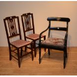 A Victorian black painted carver armchair, 89cm high, with a pair of mahogany inlaid bedroom chairs,