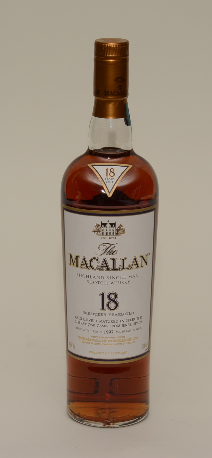The Macallan 18 year old Highland single malt scotch whisky, distilled in 1997 and in earlier years,