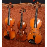 Two Chinese student violins, 50 & 56cm long, also with similar child's violin,