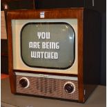 A vintage Bush walnut cased television receiver, type TV 53, serial no 100/21014,