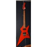 A vintage East German guitar, painted red with five strings, G.D.