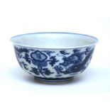 A Chinese blue and white porcelain dragon bowl, on white ground, six blue character marks to base,