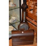 A vintage Singer portable sewing machine,