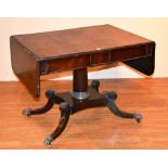 A Regency rosewood sofa table, with two drawers and opposing dummy drawer, drop flaps,