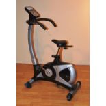 An electronic exercise bike by John Lewis, in almost new order,