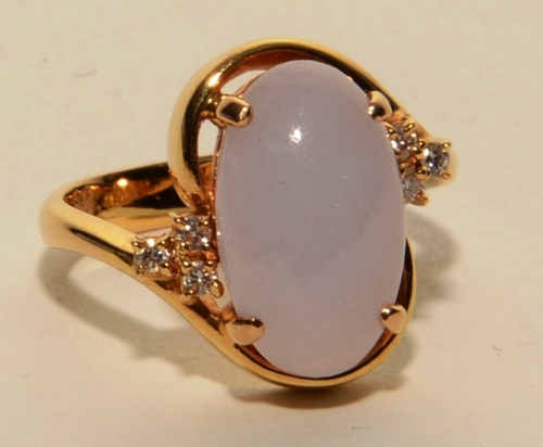 An 18ct gold jade and diamond ring,