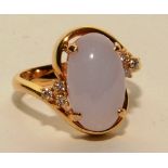 An 18ct gold jade and diamond ring,
