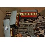 A quantity of vintage Hornby train carriages and track,