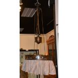 A vintage copper rise and fall ceiling light, with pulley attachment,