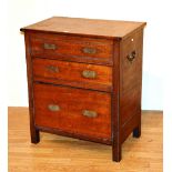 A Victorian campaign style chest of drawers, with hinged top above two drawers and deep drawer,