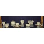 A mixed lot of 19th century and later Belleek porcelain, to include cups,