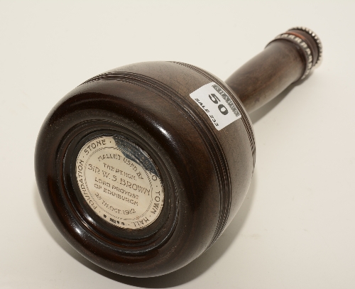 An early 20th century silver mounted presentation mallet,