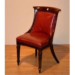 A Victorian mahogany framed gentleman's club chair, with later studded decoration,