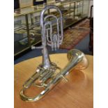 A brass trombone, 52cm long, also with plated trombone by Besson & Co,