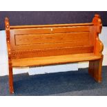 A pitch pine church pew,