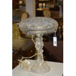 An Edwardian cut glass table lamp, with flat mushroom type shade,