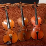 Three student violins, to include a Chinese example,