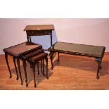 A Long John coffee table, with tooled leather top, 42cm high x 97cm wide,