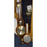 A Georgian style reproduction mahogany wall barometer, with silvered thermometer gauge and dial, 93.