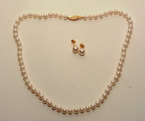 A pearl necklace and earring set, with 14ct gold clasp and backs, pearls 22cm long (fastened),