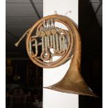 A late 19th/early 20th century brass Alliance French Horn by J.