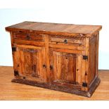 An oak cupboard chest, with two drawers above two panelled doors (old worm to areas),