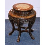 A late 19th/early 20th century Chinese rosewood jardiniere table with marble top,