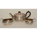 A silver three piece tea set, with hallmarks for Sheffield circa 1930's, comprising of teapot,