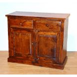 A modern hardwood cupboard chest, with two drawers above two panelled doors,