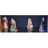 A set of four Royal Doulton 'Queens of the Realm' statuettes, comprising of Queen Anne HN3141,