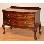 A Chippendale style mahogany bow front bedroom chest of drawers,