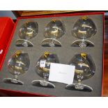 A set of six Baccarat brandy glasses, with gold coloured crown motif and monogrammed letter N,