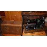 A vintage 'Federation' portable sewing machine, in oak carry case,
