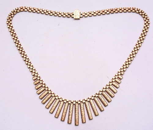 A 9ct gold necklace, of brick link formation with graduated bar drops, stamped 375 to clasp, 33g,