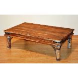 An Indian type stripped wood coffee table,