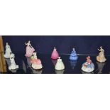 Nine Royal Doulton and Coalport bone china statuettes, comprising of Monica HN1467, Cissie HN1809,