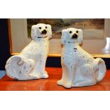 A pair of vintage pottery wally dugs, with amber glass eyes,