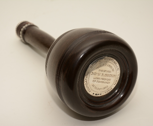 An early 20th century silver mounted presentation mallet,