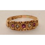 An 18ct gold ruby and diamond gypsy ring,