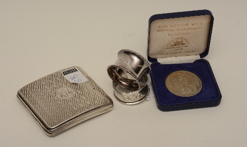 A silver cigarette case, hallmarks for Birmingham 1923-24, with engine turned decoration,