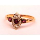 An 18ct gold ruby and diamond dress ring,