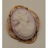 A 9ct gold cameo brooch, depicting relief of Classical female, stamped 9ct to underside, 3.